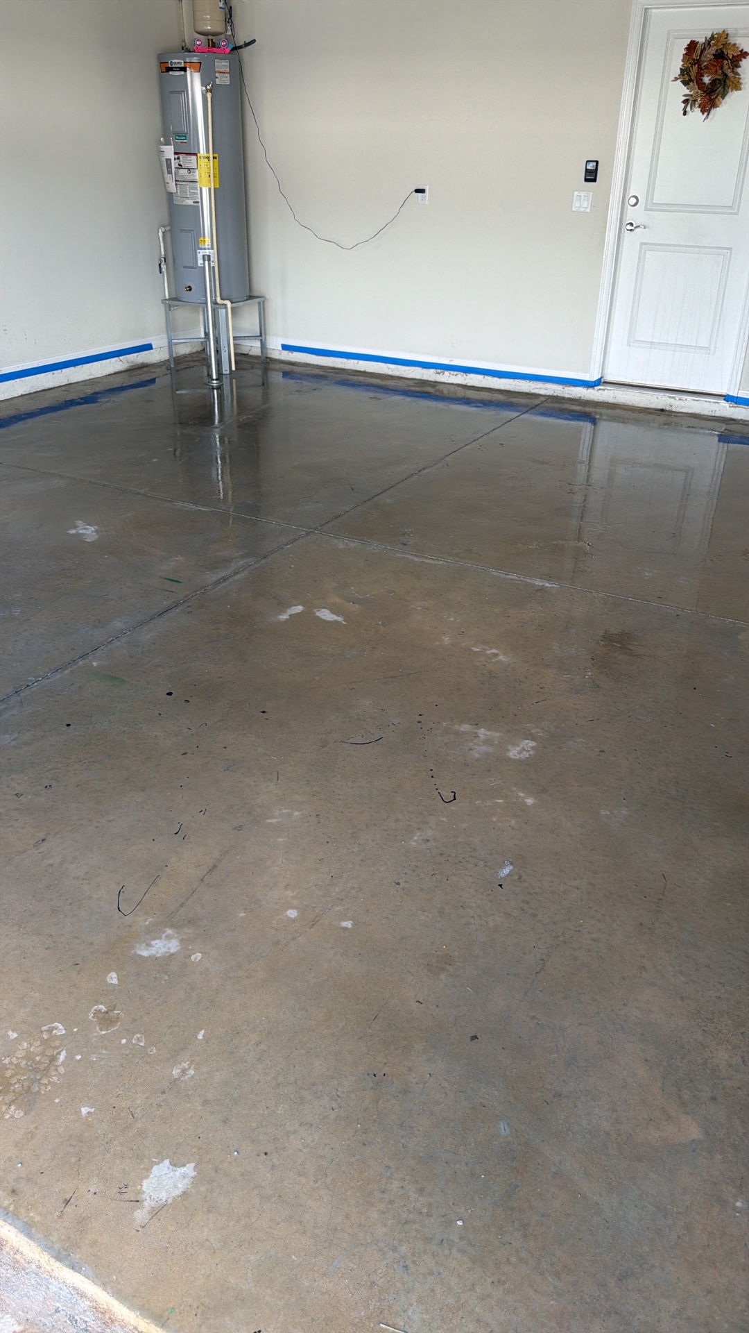 Garage epoxy coating before Prime Finish Services